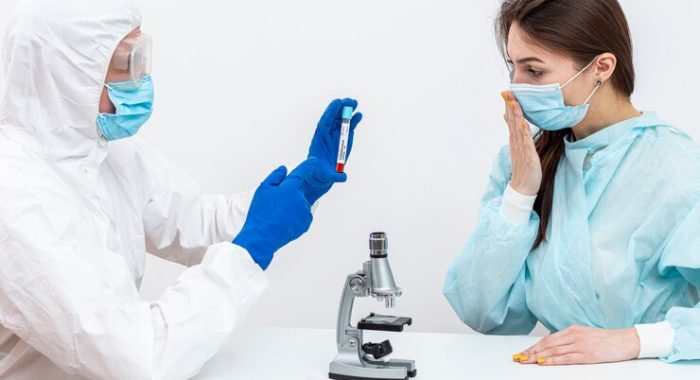 person-hazmat-suit-with-pacient_23-2148483210
